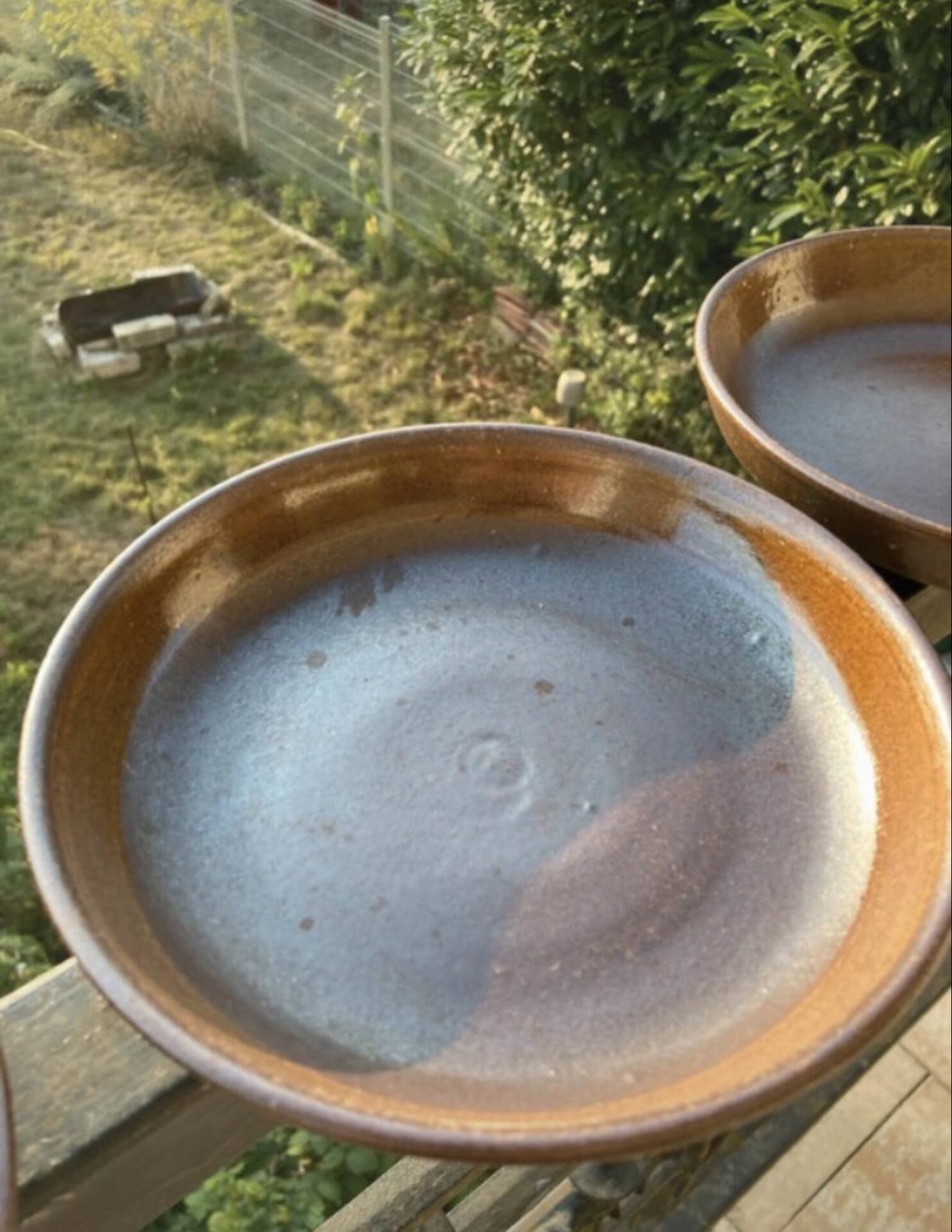 Organic earthenware deep plates from Gré du Marais, France.