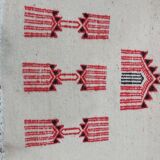 Traditional handmade white and red carpet