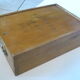 Wooden storage box marked "with a golden hammer"