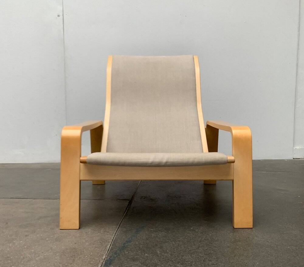 Pulkka lounge chair set in mid-century style with ottoman by Ilmari Lappalainen for Asko, Finland, 1960s.