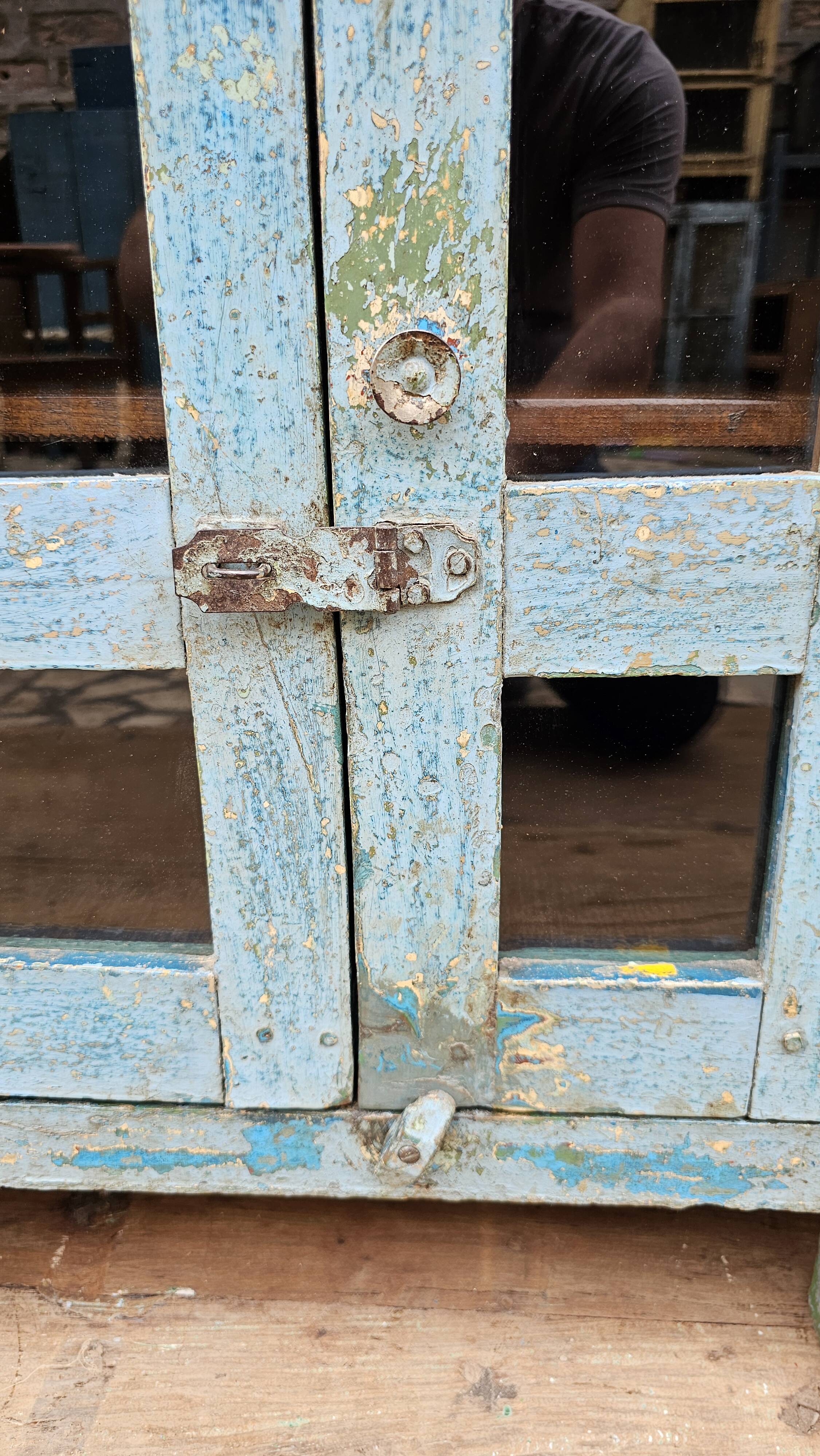 Antique glass-fronted buffet in Burmese teak