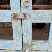 Antique glass-fronted buffet in Burmese teak