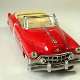 Red Cadillac 50s model car, made of metal, vintage from the 1970s