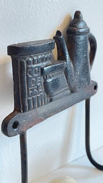 Coat rack made of steel and porcelain