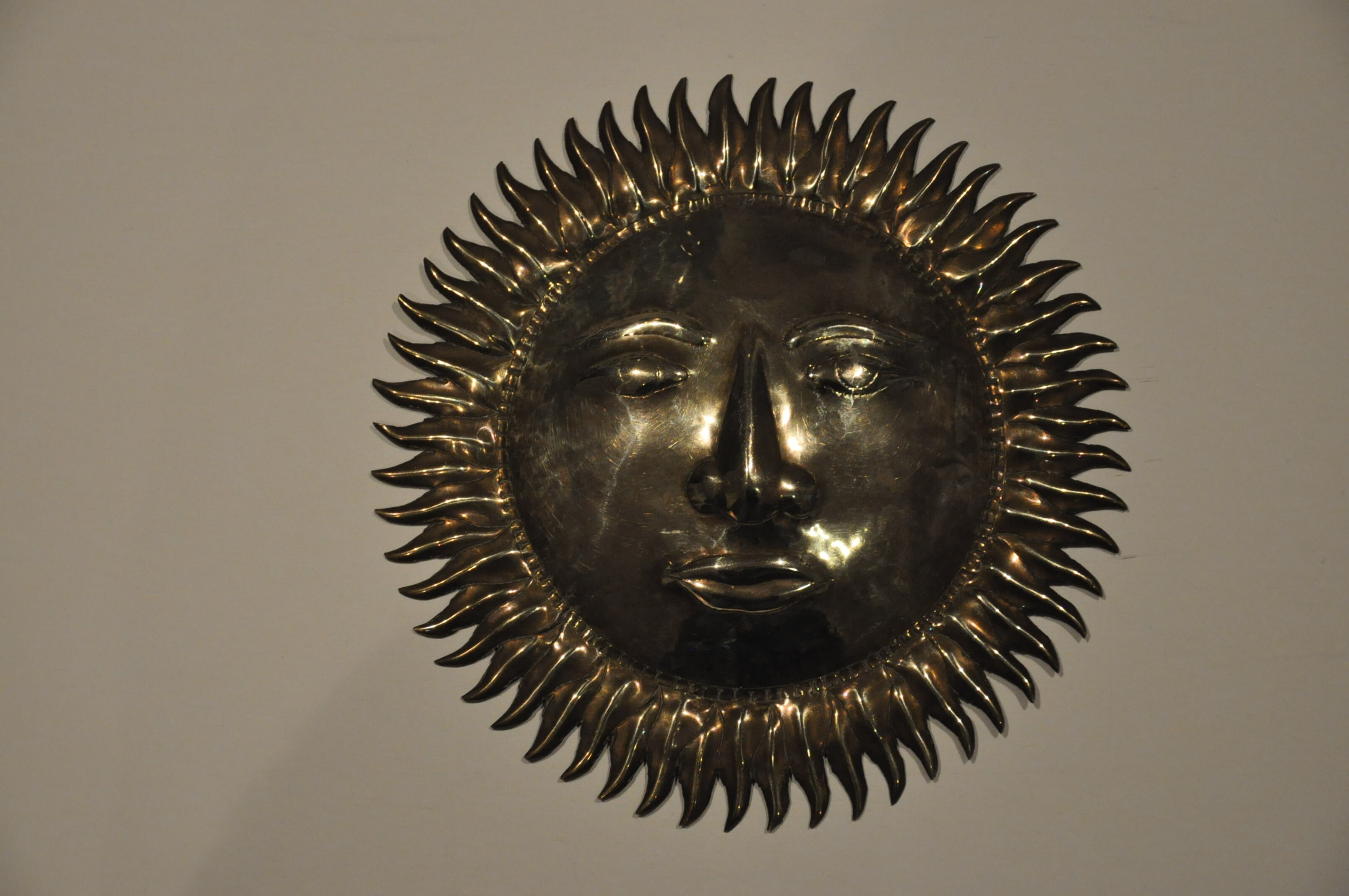 Vintage brass sun
