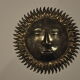 Vintage brass sun