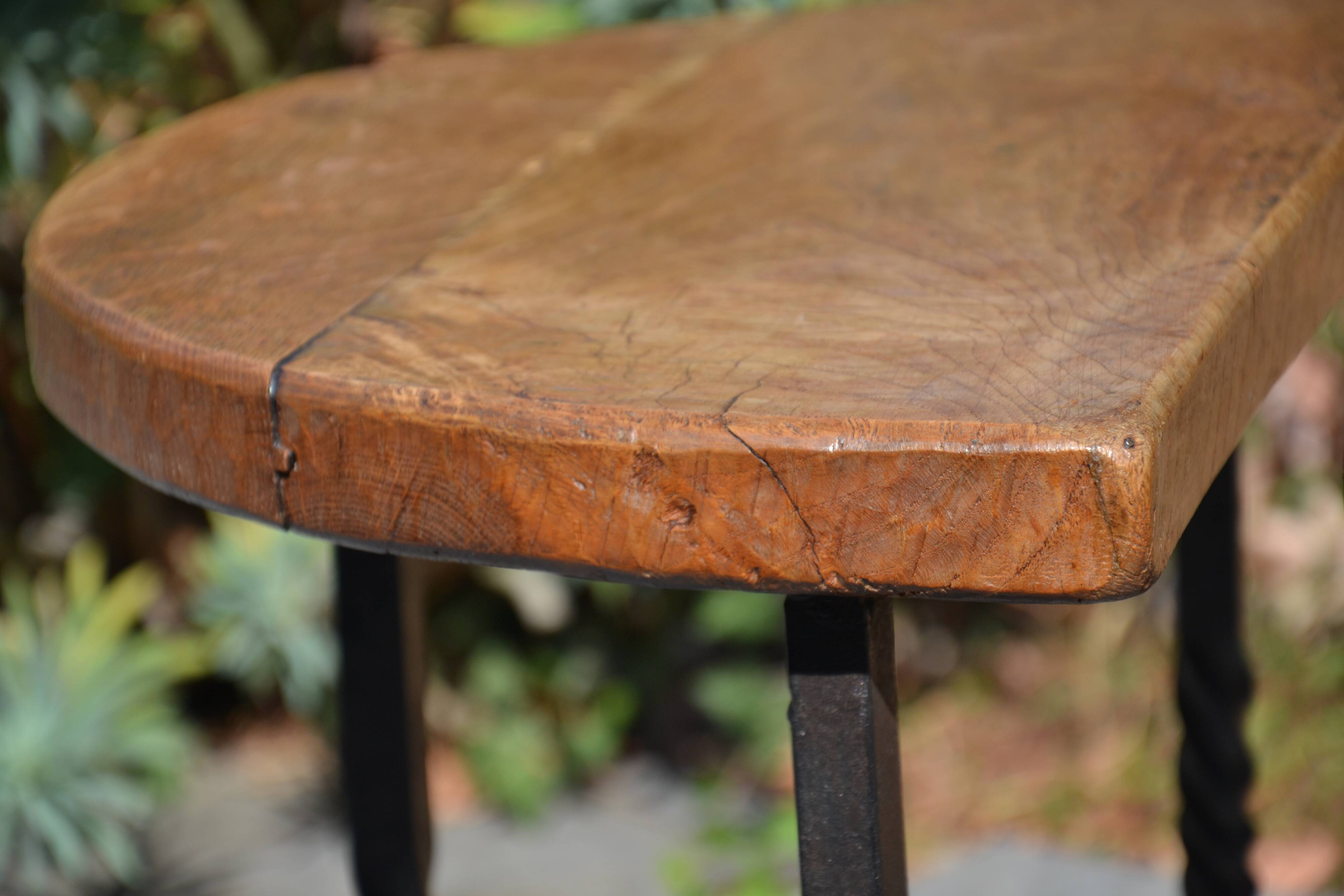 Unusual modular coffee table in oak and wrought iron.