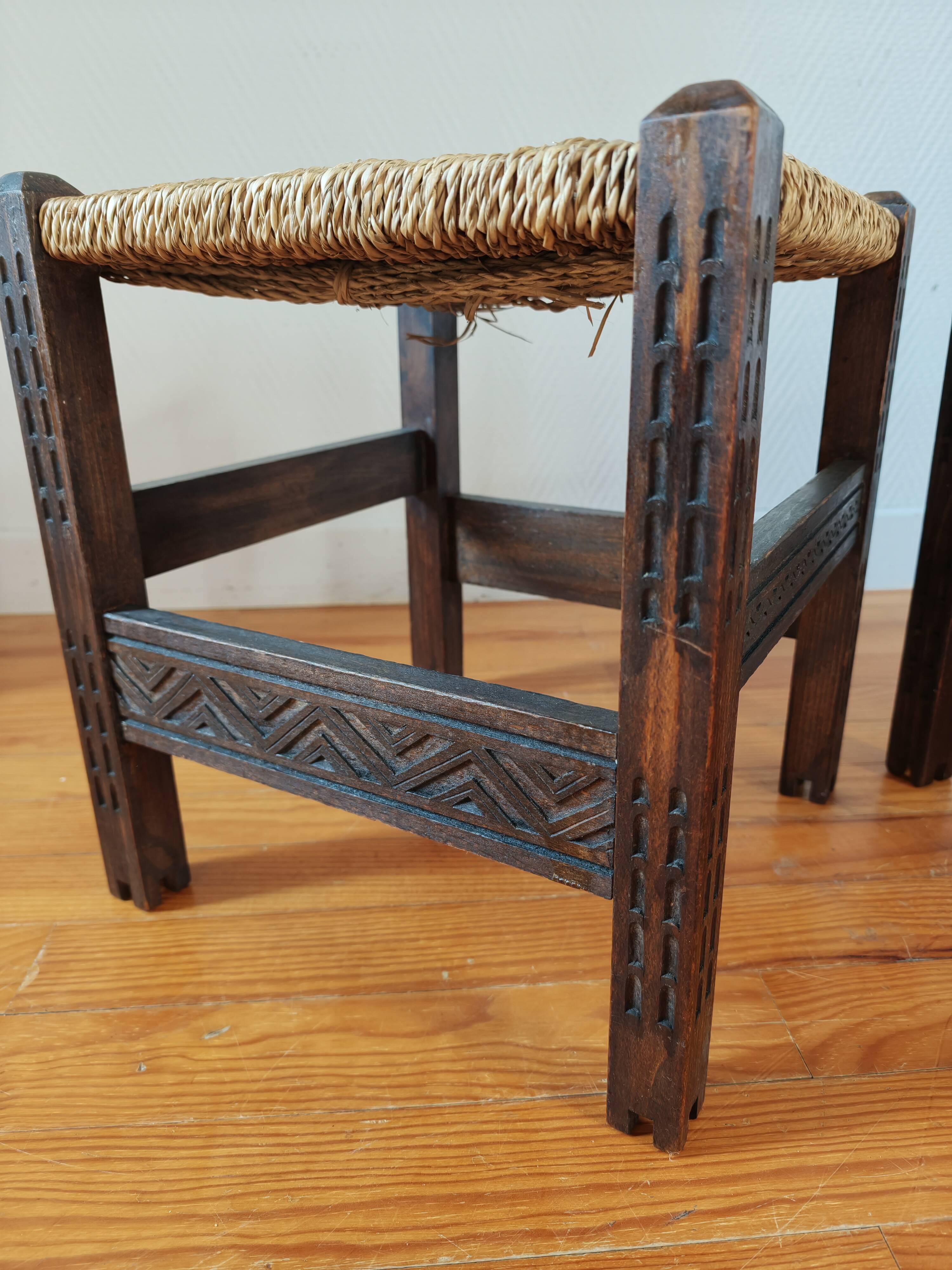 Pair of handcrafted stools from Friuli in carved wood, Italy, circa 1960.