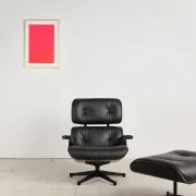 Lounge Chair and ottoman in black leather by Charles & Ray Eames, Vitra