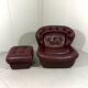 French burgundy leather space age lounge chair & footstool 1970’s