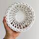 Openwork white porcelain bowl