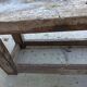 Wooden carpenter's workbench with iron and wooden vice
