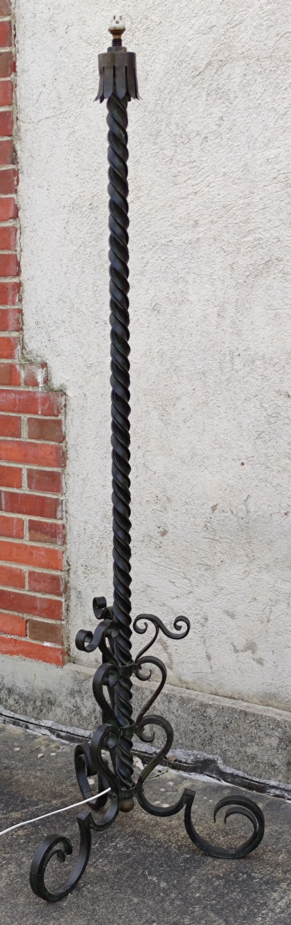 Wrought iron tripod floor lamp