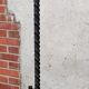 Wrought iron tripod floor lamp