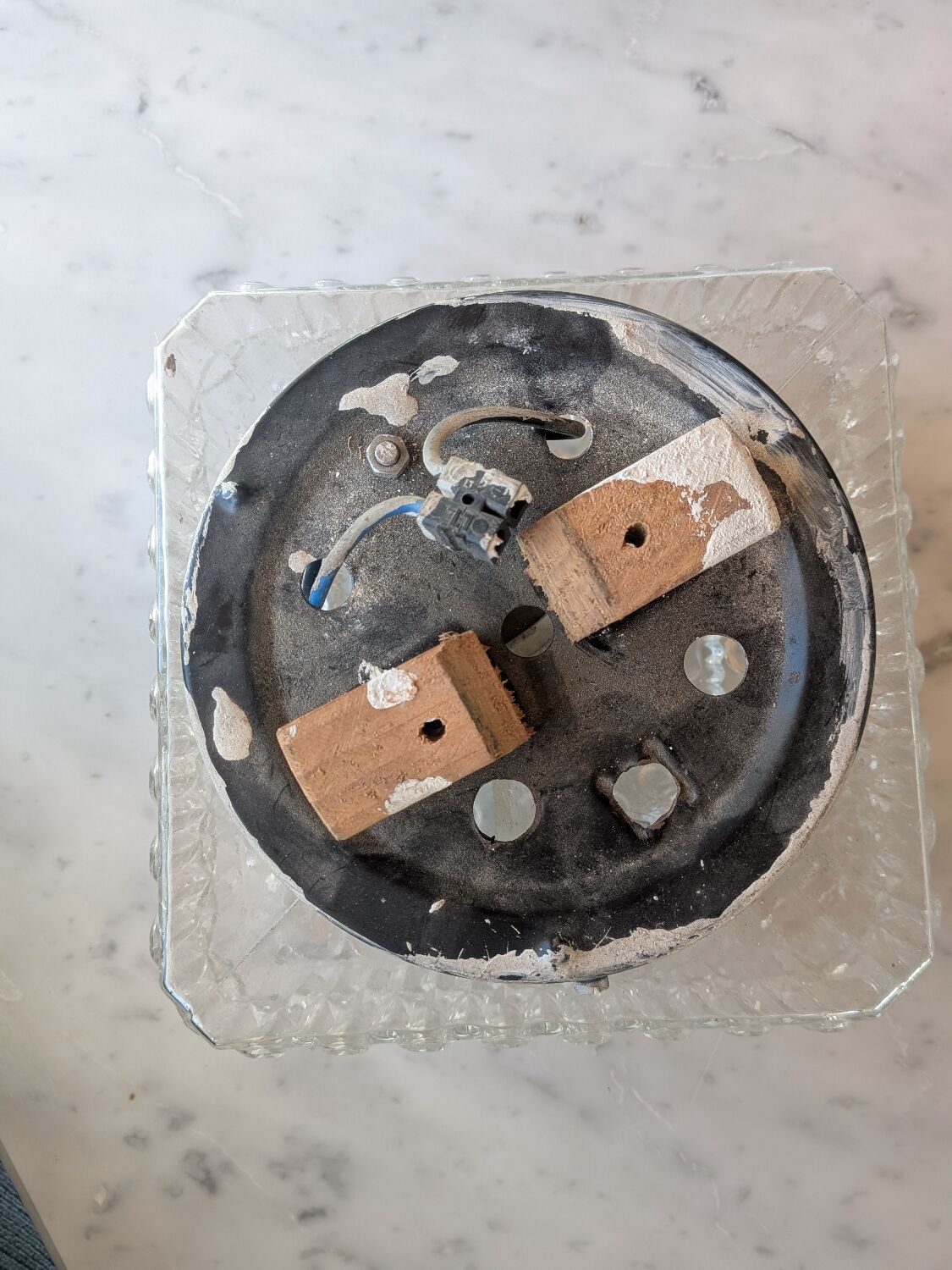 Pressed glass wall light