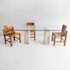 Dining table in travertine and glass with sculpted legs, 1970s.