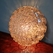 Amber glass honeycomb ceiling light, design by Helena Tynell, 1970.