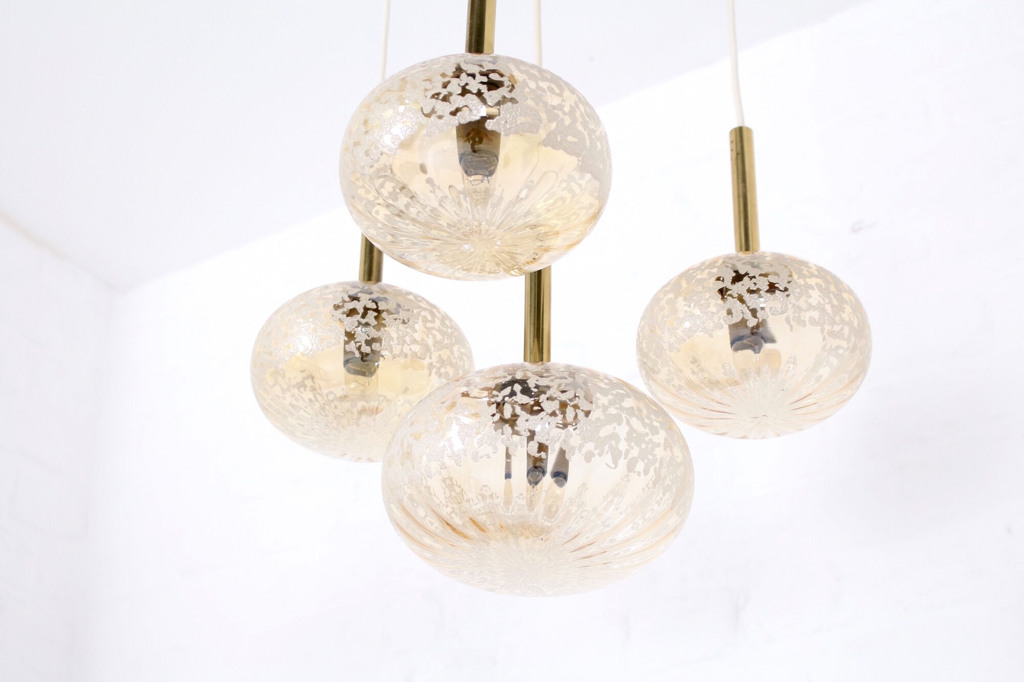 Cascade chandelier 4 globe in blown amber glass