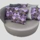 Circular rotating leather canapé with 6 cushions.