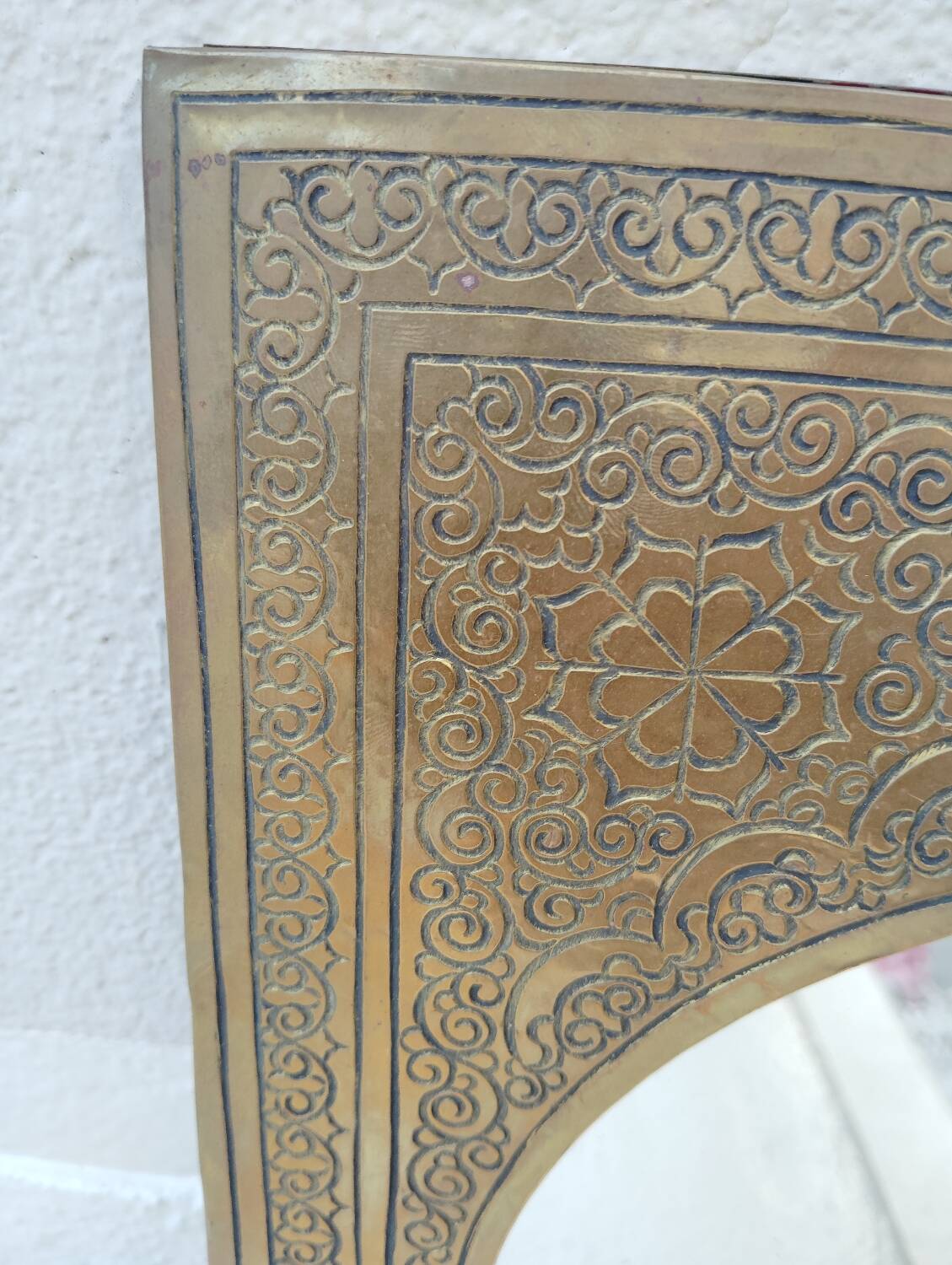 Golden oriental mirror