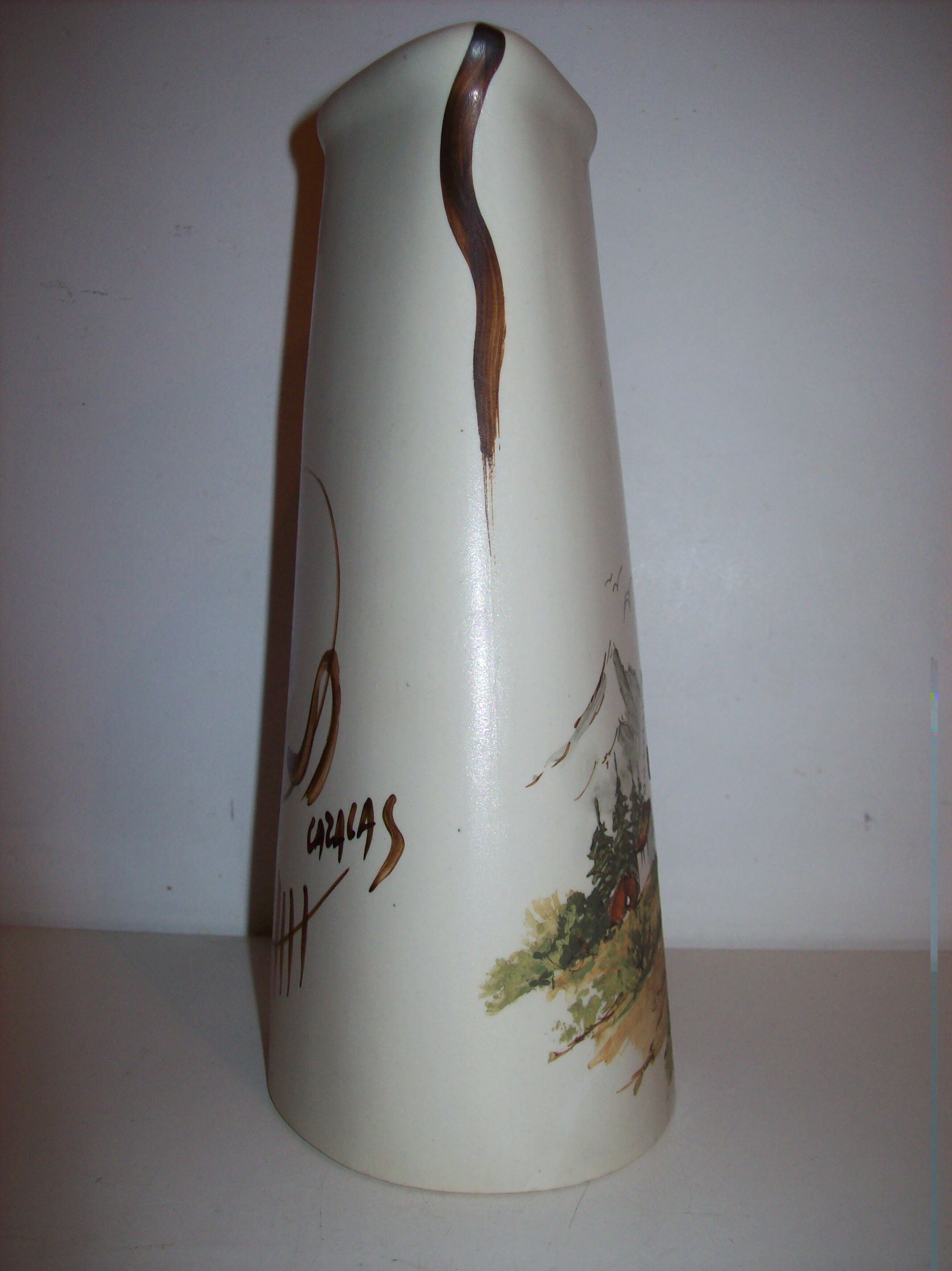 Ceramic pitcher with hand-painted decoration