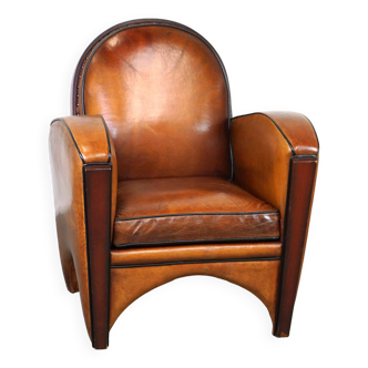 Great sheep leather Artdeco design armchair with a unique design