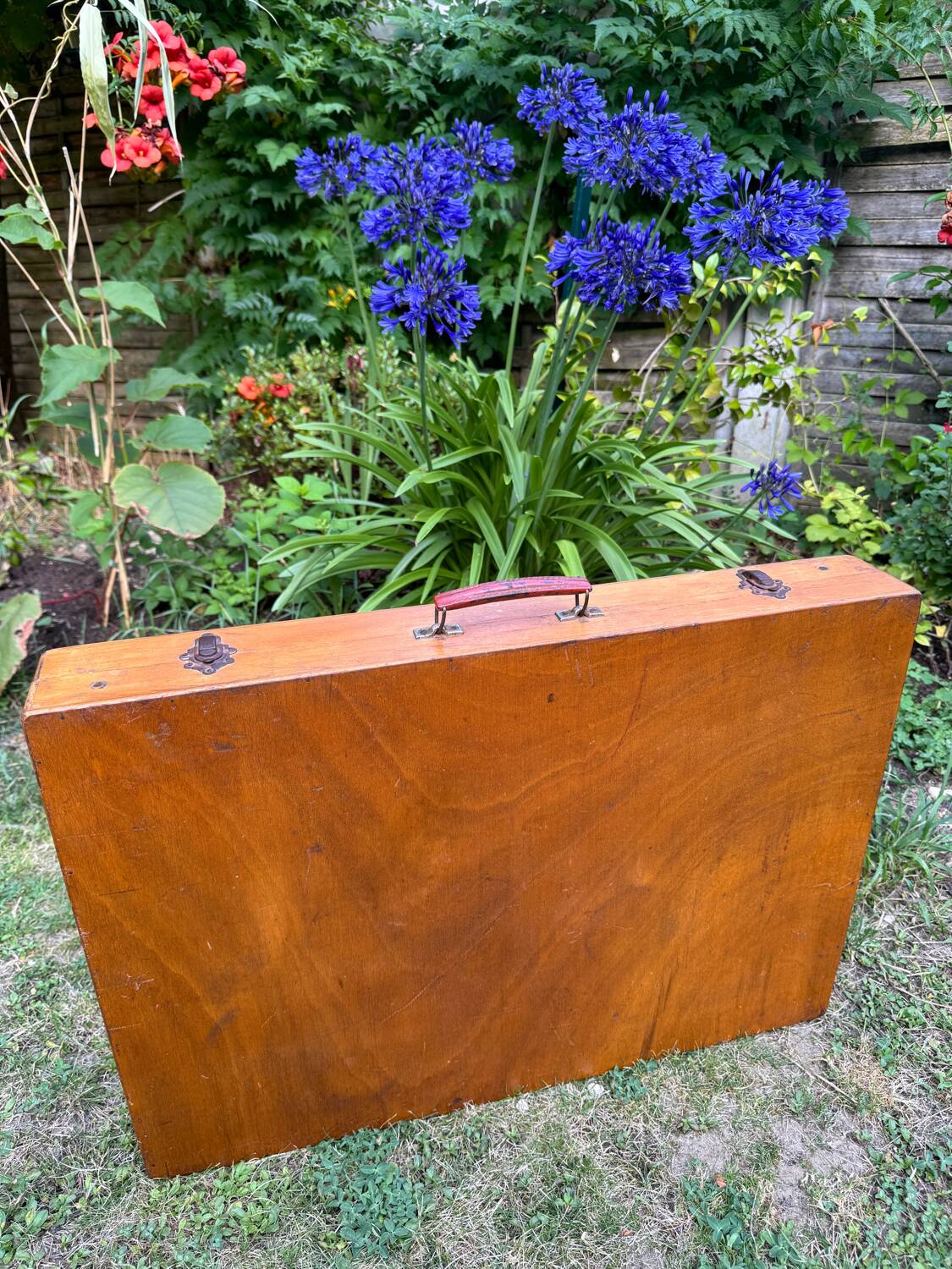 Old suitcase, table and stools, vintage wooden picnic