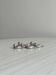 Set of 6 silver-plated metal ducks, name holders and knife rests.