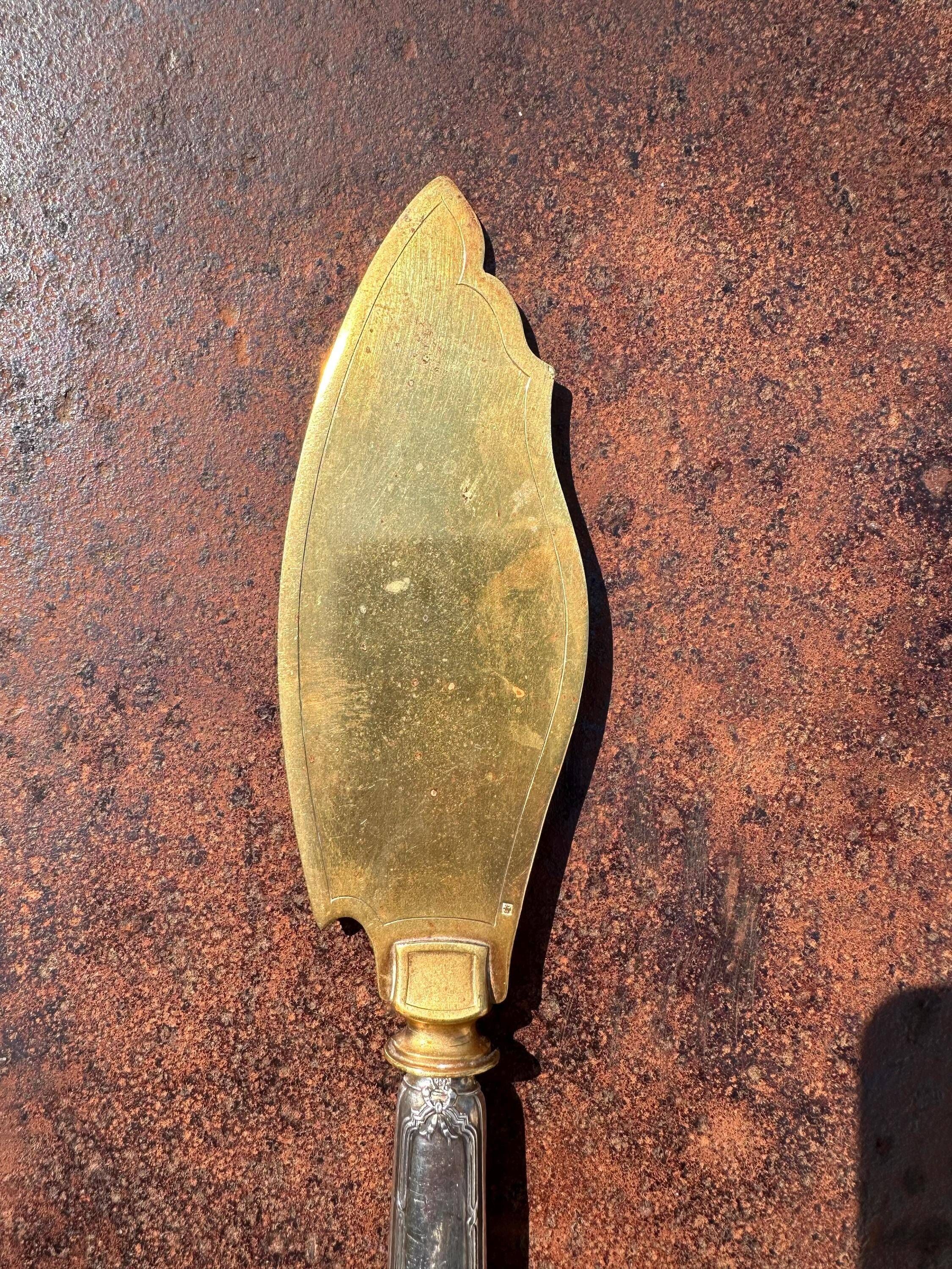 Silver-handled pie server Minerve, golden blade, Louis style.