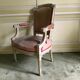 Directoire style armchair in patinated beech XX century