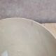 Old ironstone bowl with vintage blue and ochre decoration.