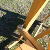 Pair of vintage folding chairs in light wood