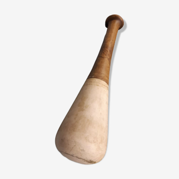 Imposing ancient ceramic pestle and wood