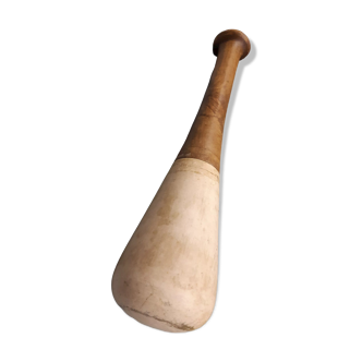 Imposing ancient ceramic pestle and wood