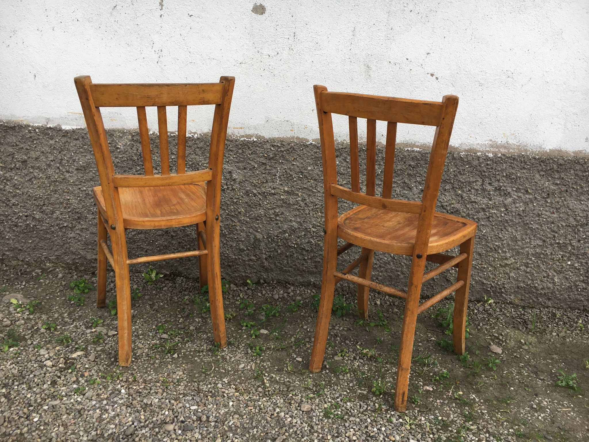 Pair of vintage curved wooden bistro chairs