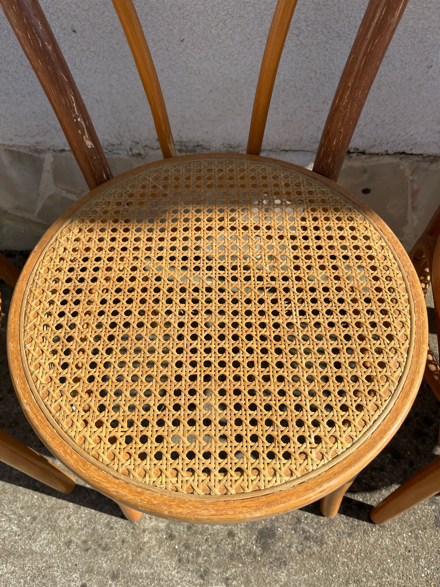 Set of 4 bentwood bistro chairs with caning.