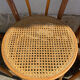 Set of 4 bentwood bistro chairs with caning.