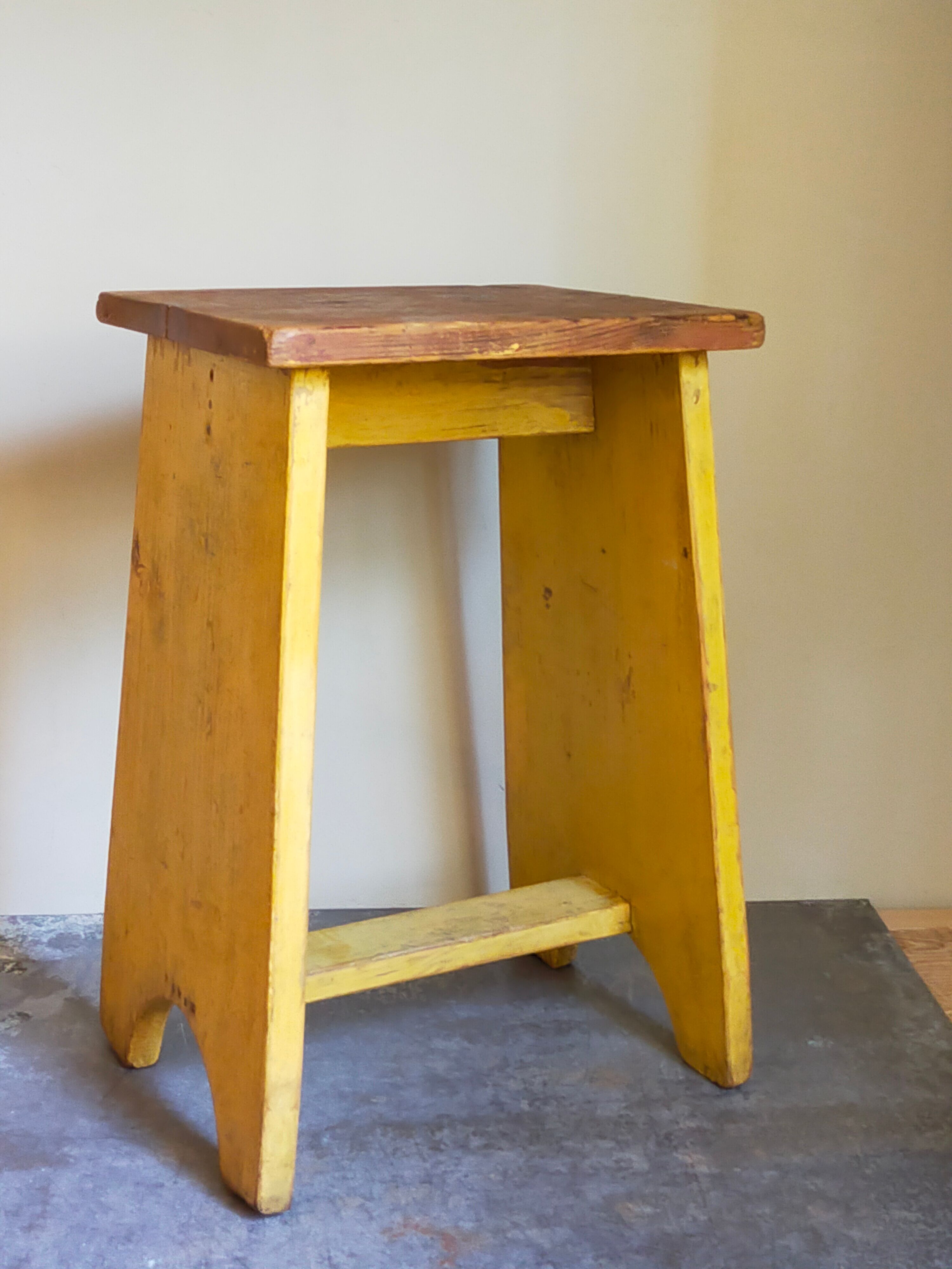 Art-populaire workshop stool in patinated painted wood
