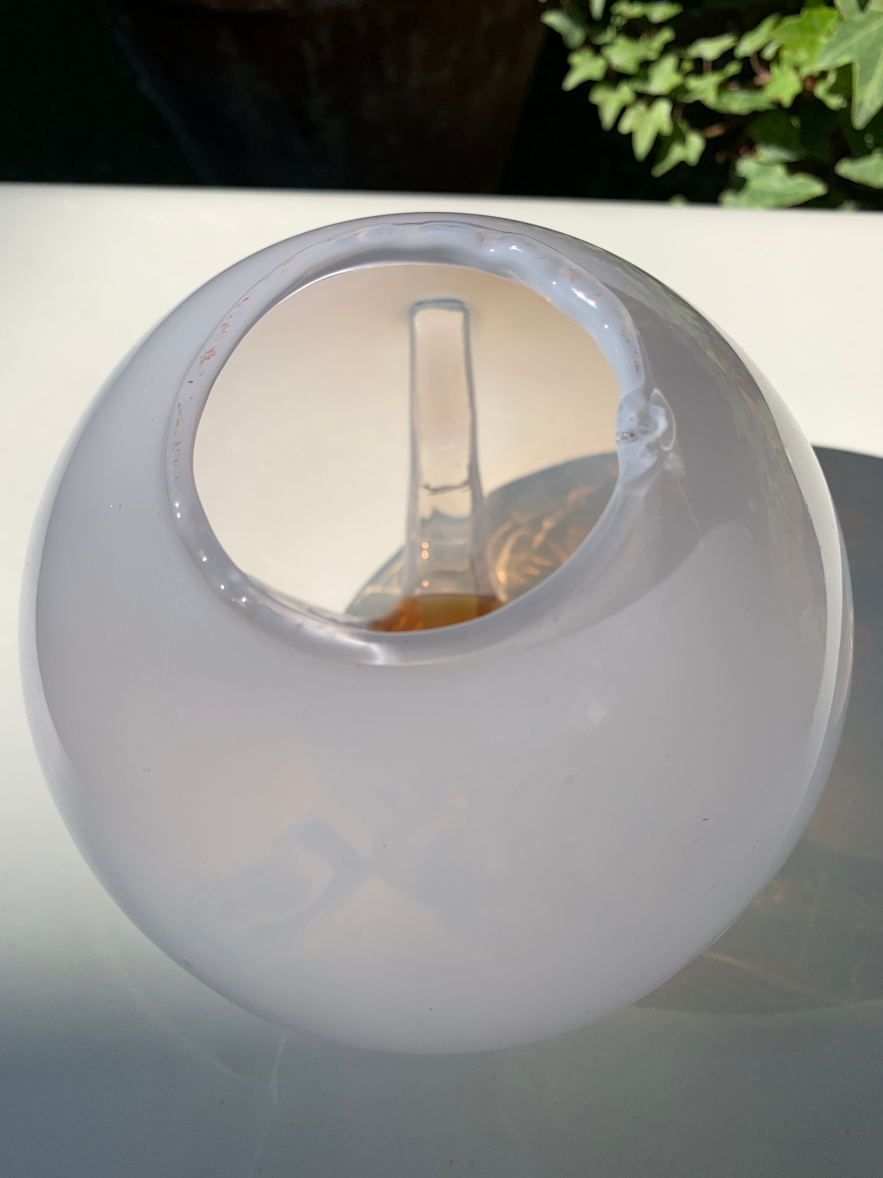 Two-tone blown glass globe for suspension