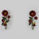 Pair of vintage Italian wall lamps in painted sheet metal. Decoration flowers. Year 50 60