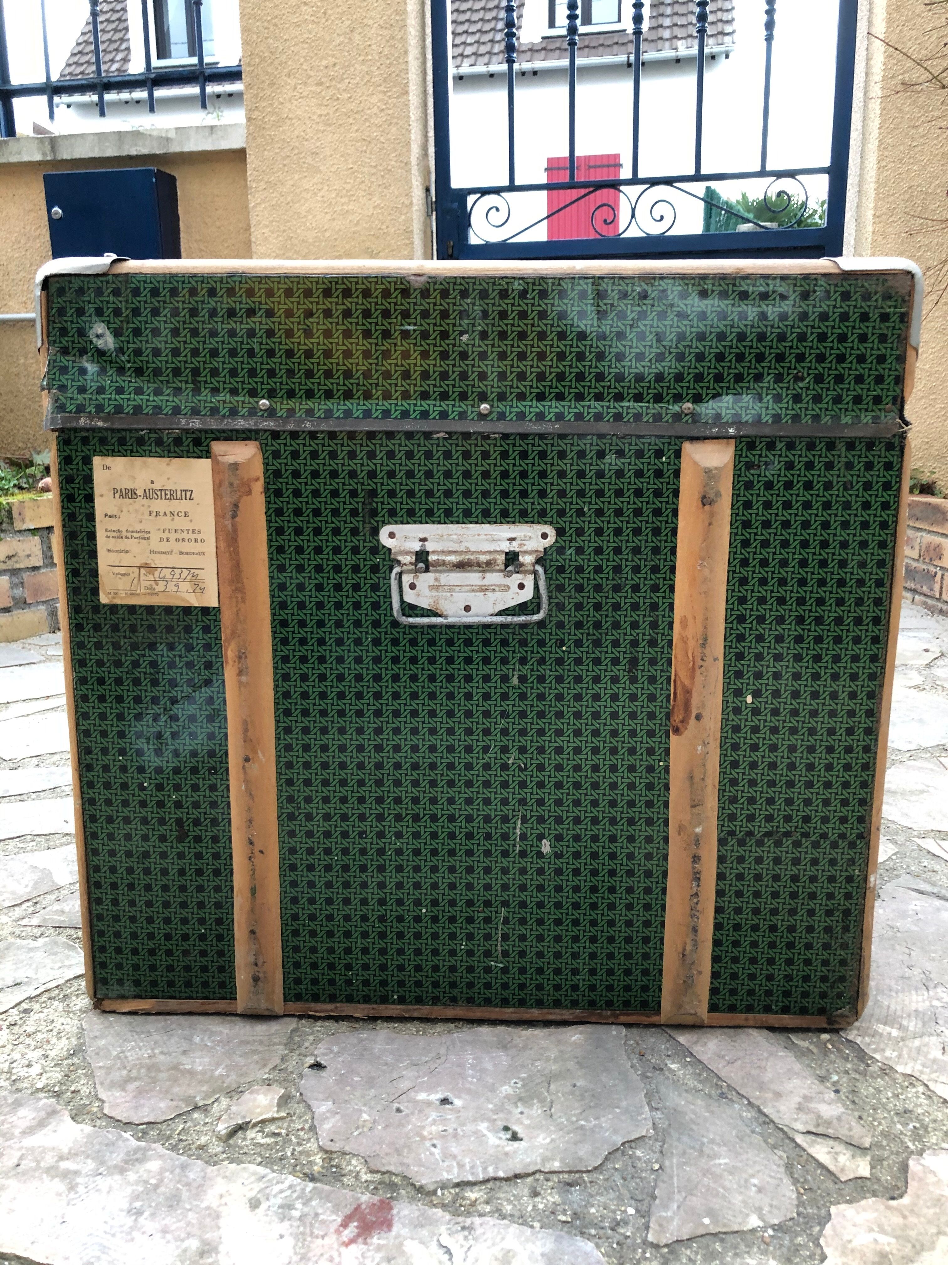 Wooden trunk lined with metal