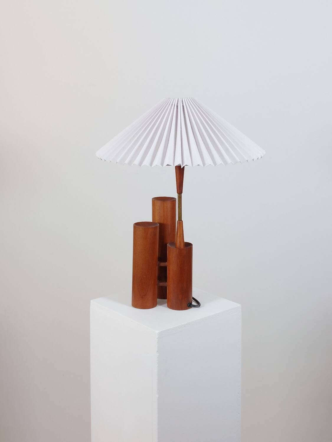 Vintage 50s wooden table lamp with pleated shade.