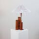 Vintage 50s wooden table lamp with pleated shade.