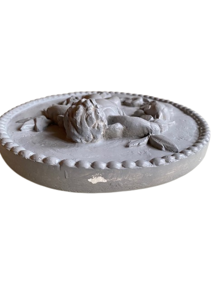 Plaster medallion cherub and garland of flowers patinated gray