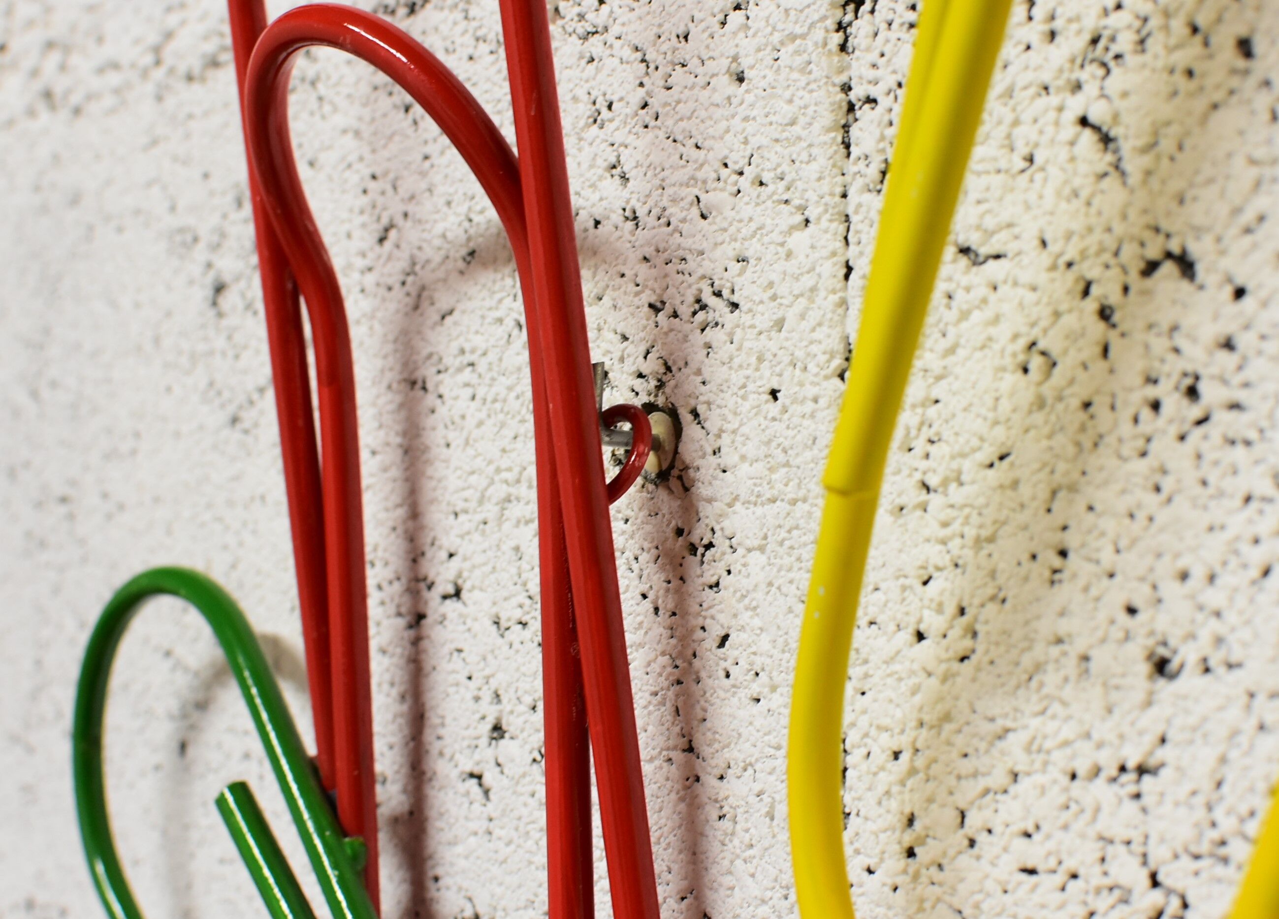 Vintage trombone coat rack.