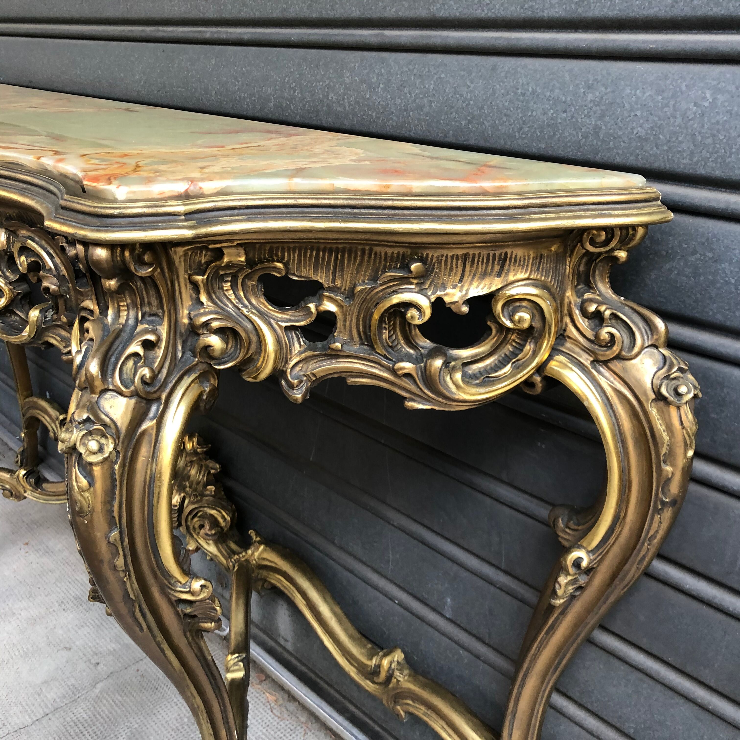 Golden wooden console on onyx Venetian baroque style