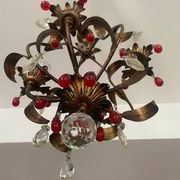 Antique chandelier in gilded sheet metal and red and white crystal pendants, 1900