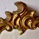 Large rococo mirror in gold painted wood