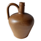 Beautiful vintage handmade oil or wine pot in glazed brown stoneware.