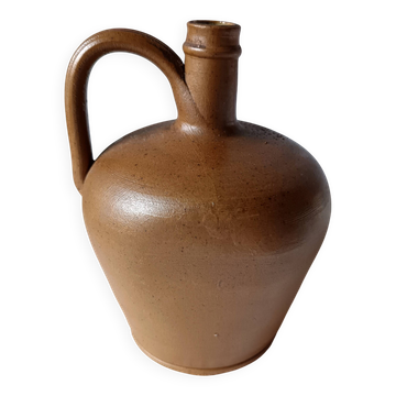 Beautiful vintage handmade oil or wine pot in glazed brown stoneware.